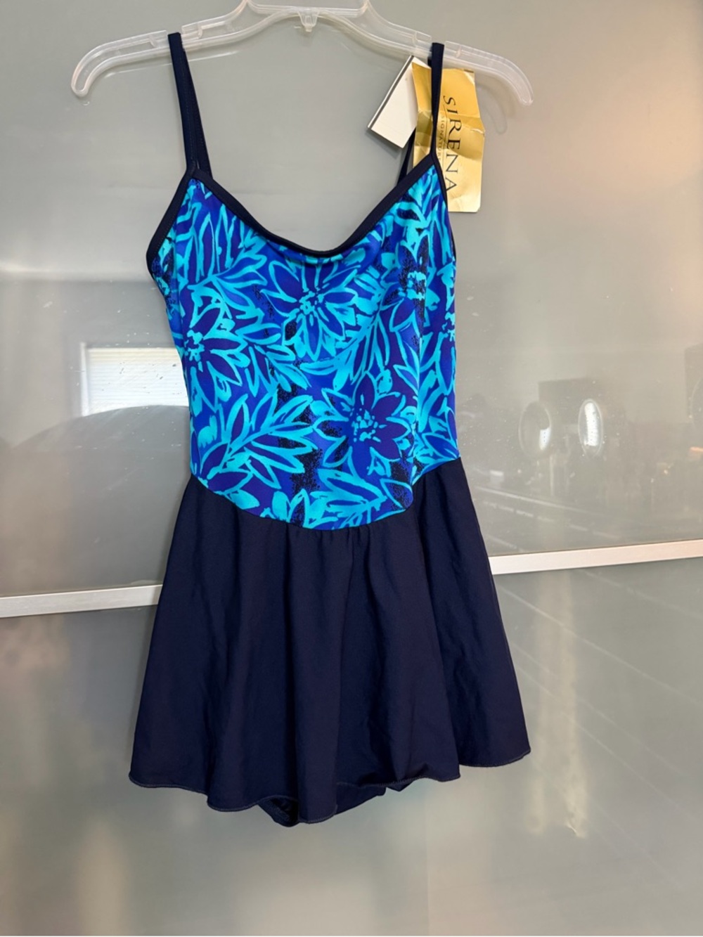 Women’s Blue Floral Swim Dress with attached  Black Skirt
Size 10